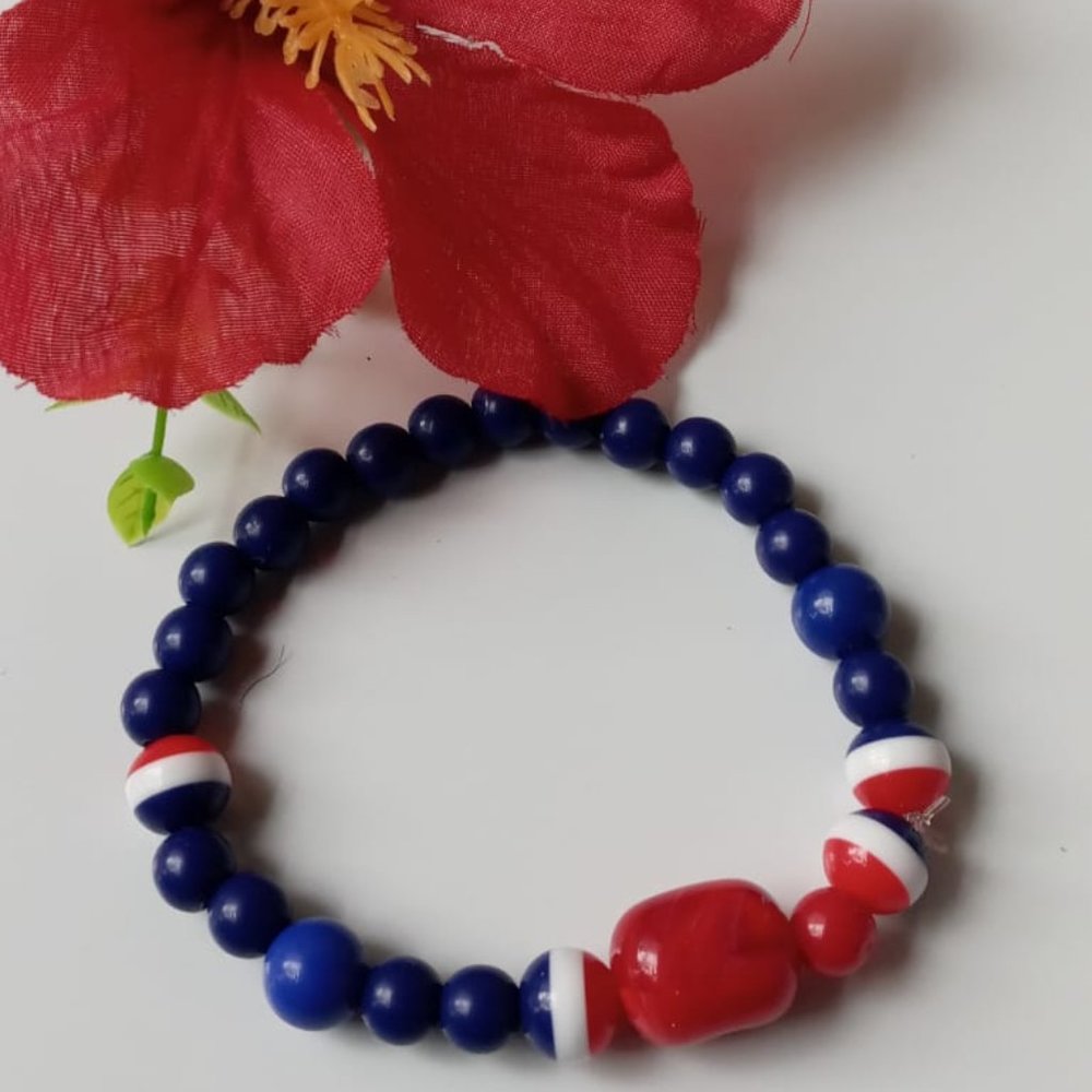 Blue, red, and white bracelet